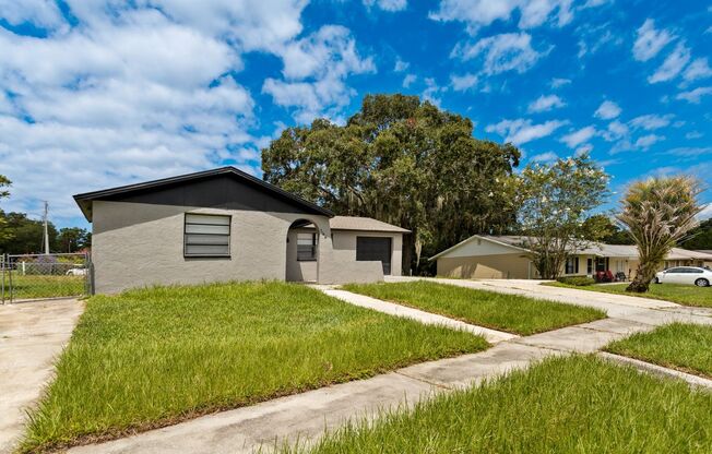 Nice Block home on corner lot 3bdrm/1bath home with attached garage, shed and large fenced yard