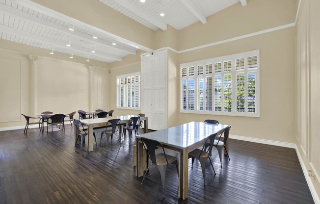 a dining room with a table and chairs at Willow Tree Apartments, Torrance
