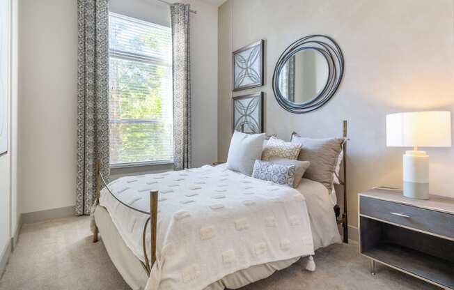 an example of a bedroom with a bed and a window