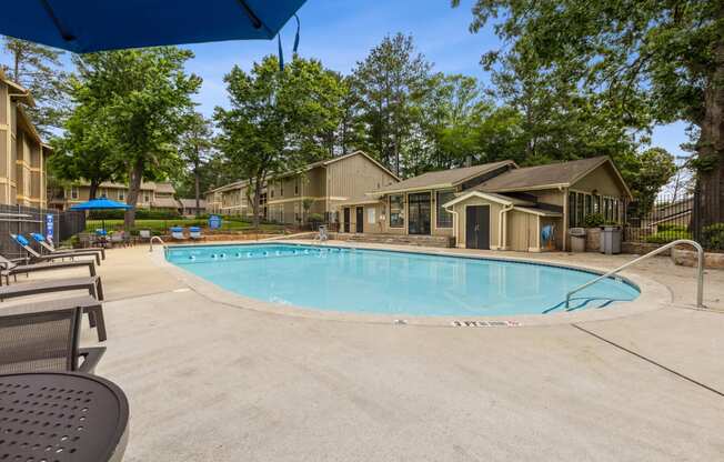 our resort style swimming pool is next to our apartment buildings