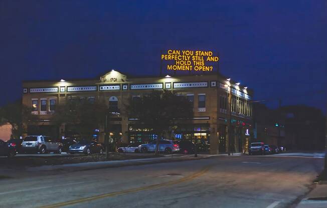 Building Sign Lit in the Evening