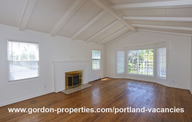 SE 57th Ave - 5 bedroom home with fireplace and hardwood floors