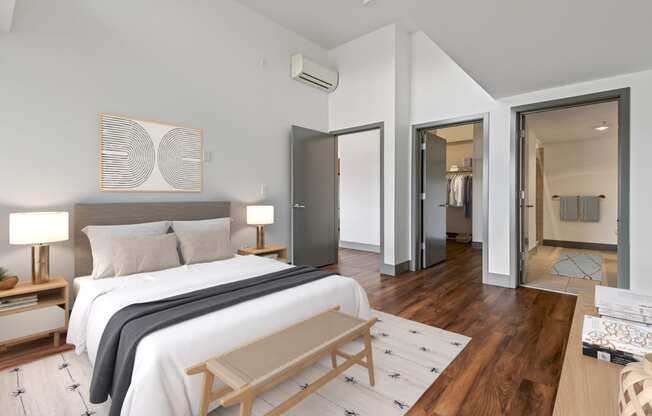 Bedroom with a large bed and a closet at Equinox, Seattle, WA, 98102