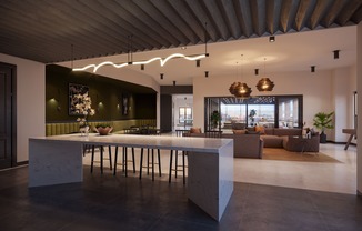 The 6th-floor roof lounge comes with a kitchen and outdoor space, providing a perfect setting for socializing.