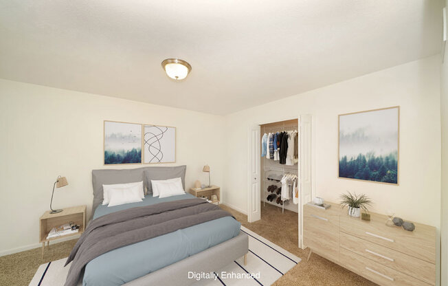 a bedroom with a bed and a closet at Foxwood and The Hermitage, Portage