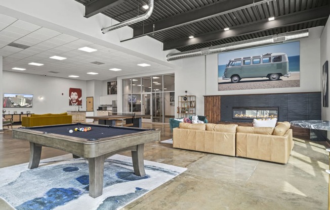 a games room with a pool table and couches  at The Icon, Richmond, 23230