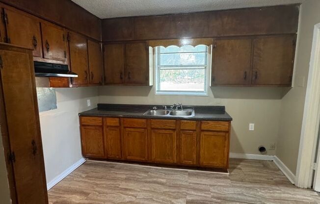4 Success Realty is now offering this beautiful 4 bedroom 1 bath home with large front and backyard with corner lot.