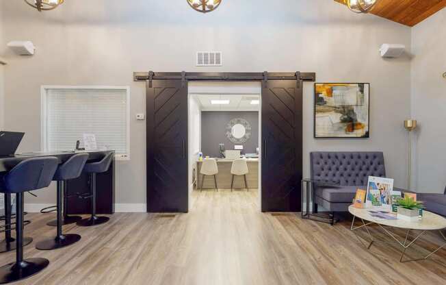 a conference room with a sliding barn door