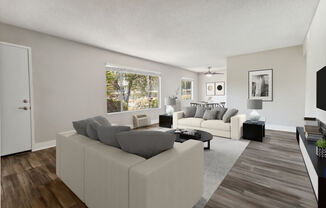 Model Living Room with Wood-Style Flooring & Window View at Forest Park Apartments in El Cajon, CA.