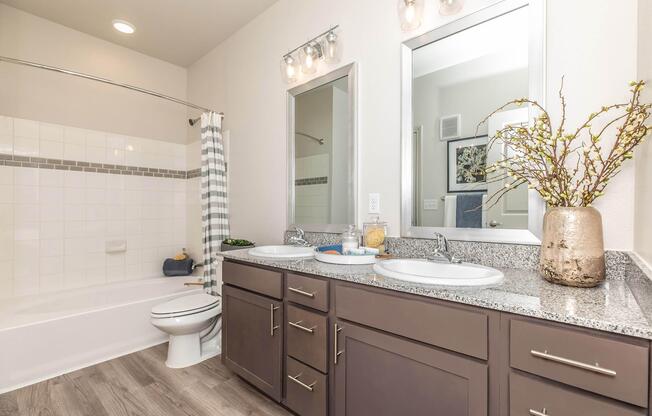 a kitchen with a sink and a mirror