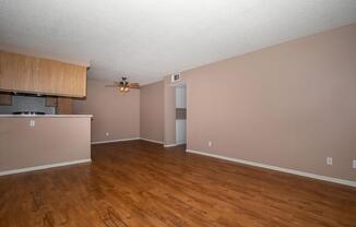 living room and dining room with wooden floors