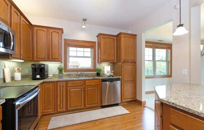 Laurel East End Apartments in Golden Valley, MN photo of a kitchen with wooden cabinets