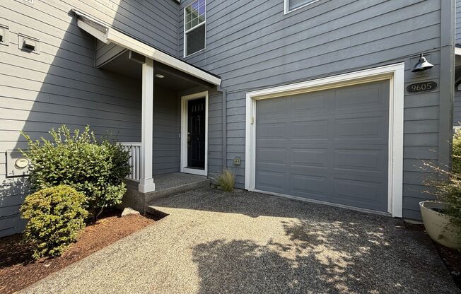 Bright Cedar Mill Townhome-Style Home with Vaulted Living Room, Skylight, Garage & Modern Kitchen
