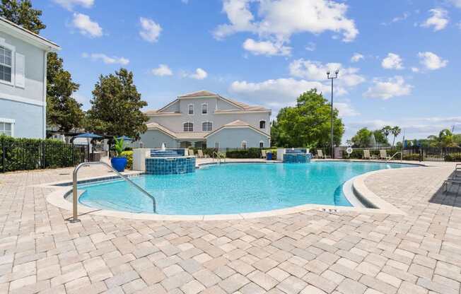 Community Pool with Lounge Chairs at Ballantrae Apartments, Sanford