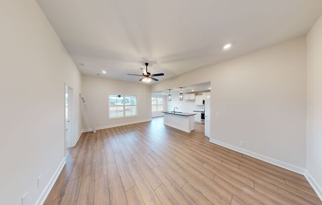 Open-Concept Home with Modern Upgrades Featuring Hardwood Flooring and Open Kitchen