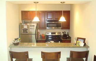 Top-Floor Apartment in IronHouse Place, Directly Across from the Siegel Center