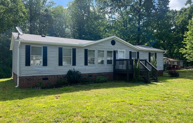 Introducing a charming 4-bedroom, 2-bathroom house in the desirable Gastonia, NC area