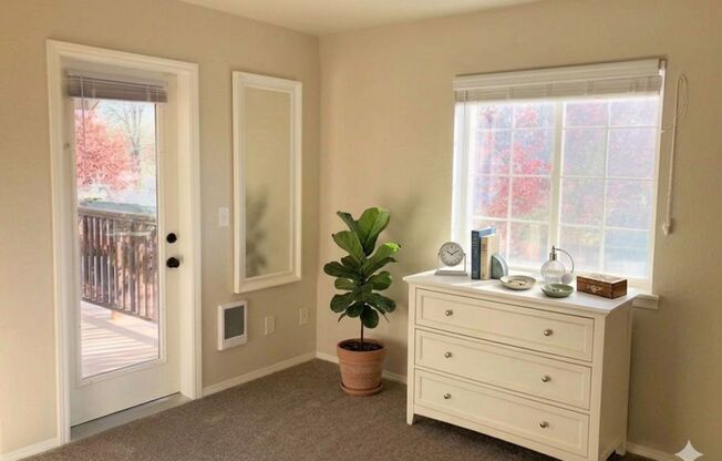 **$500 OFF THE 2ND MONTH'S RENT** Beautifully Remodeled 3 Bedroom Townhome w/ Garage, W/D, Fireplace, and Private Balcony & Patio!