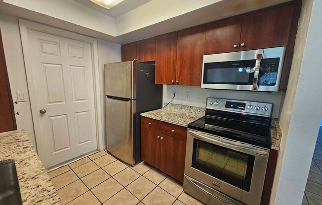 Location Location Location of this nice 3 bed 2 bath 1 car garage duplex in Cape Coral!