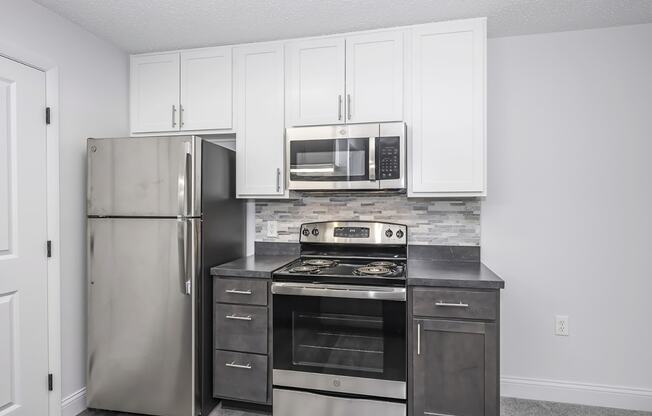 Electric Range In Kitchen at Honey Creek, Greenwood, Indiana