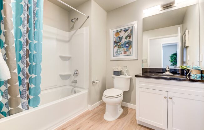Pet-Friendly Apartments in Upland Oakland, CA - Rowhaus Apartments Bathroom with Vanity and Garden Tub