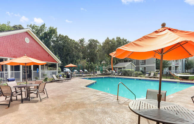 Poolside cabanas and picnic tables