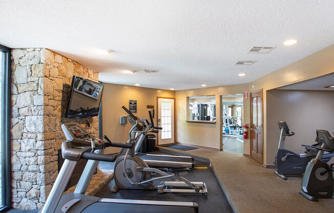 fitness center at apartment complex