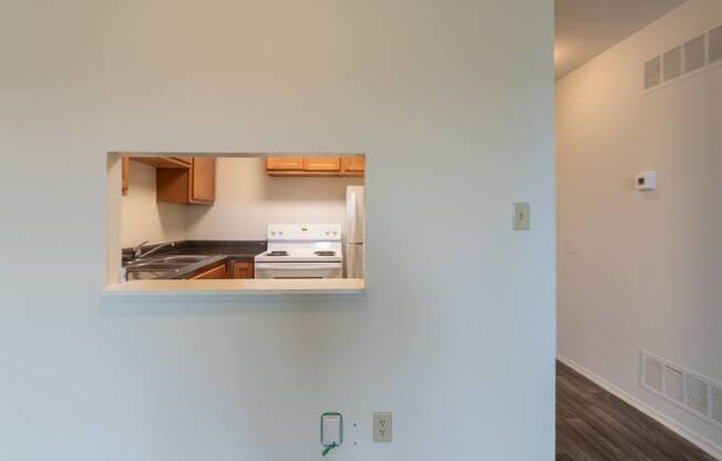 This is a photo of the kitchen pass through in a 560 square foot 1, 1 bath apartment at Park Lane Apartments in Cincinnati, OH.