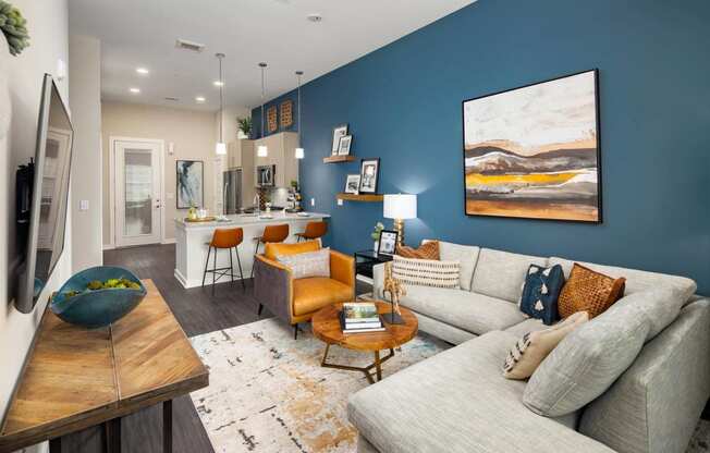a living room with a couch and a table