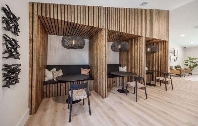 a restaurant with wooden walls and wooden tables and chairs