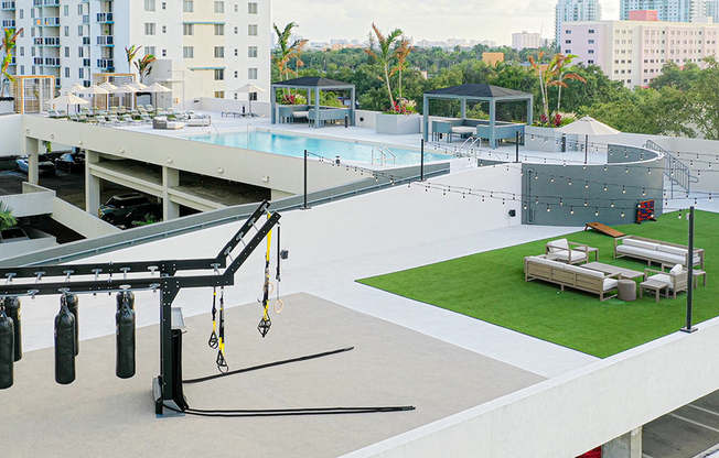 A fully refreshed sky deck with pool, fitness area, social lawn and cabanas