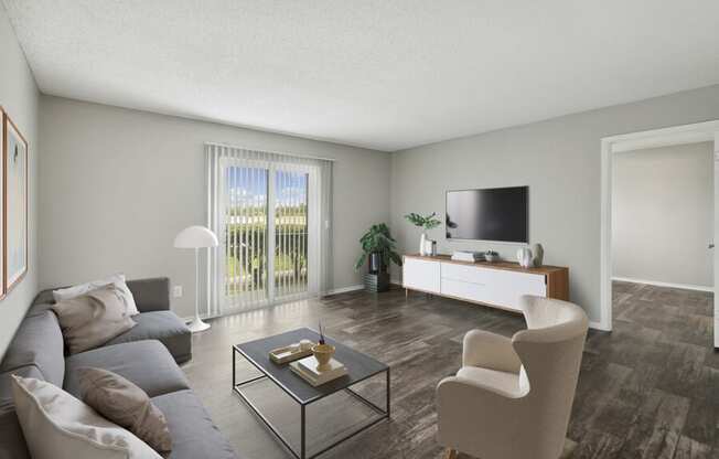 a living room with gray walls and a sliding glass door