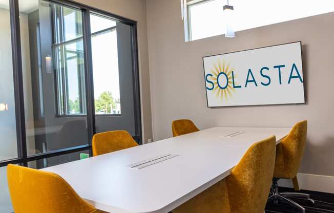 apartments conference room with a white table at Solasta, Sacramento, CA, 95831