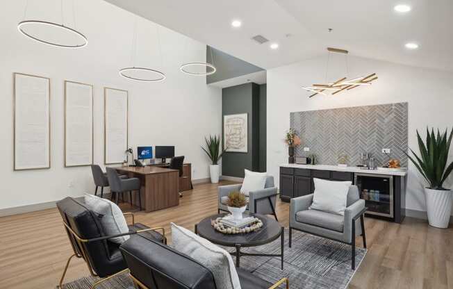 a living room with couches and chairs and a table