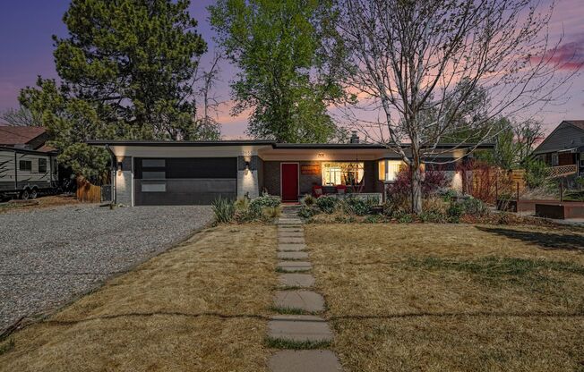 Sunlit Wheat Ridge Gem with Huge Wooded Backyard