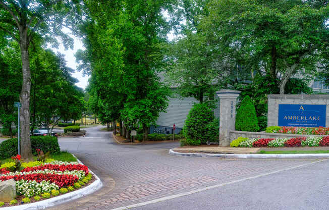 a driveway with a sign that says amarante at the end of it