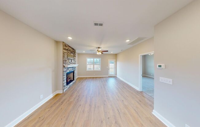 Stylish Home with Feature Stone Front Fireplace, Open Layout and Premium Upgrades