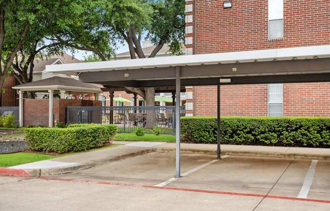 A parking lot with a red line painted on the pavement.