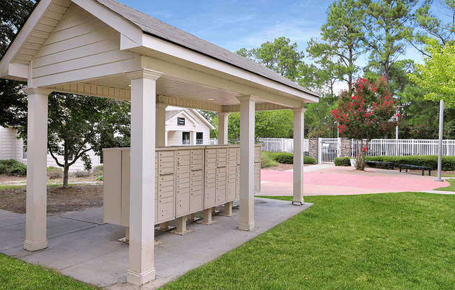 a gazebo with a mail box area