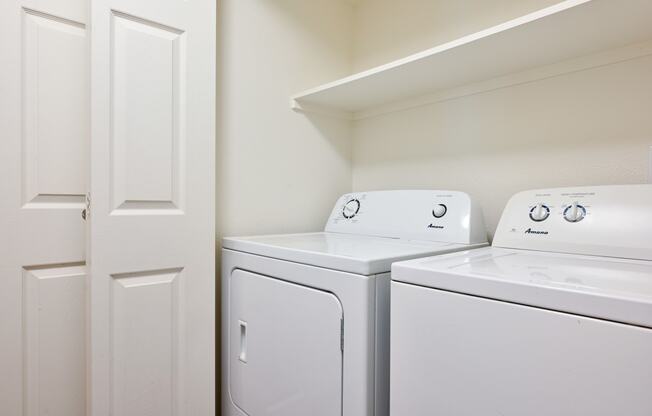 a washer and dryer in a laundry room