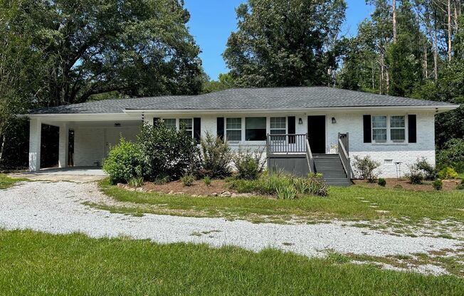365 Palmetto Rd - Available May 10! Privately Located on 1 Acre. Recently Renovated (2023). Minutes to I-85 Access. Fayette County Schools!