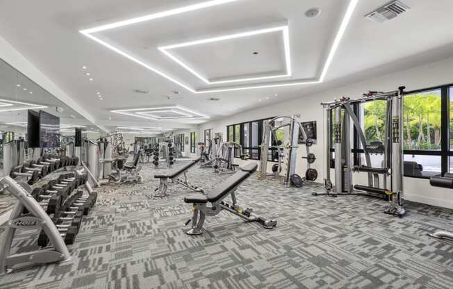 Resident Fitness Center featuring Hi-Tech Cardio Gear & Free Weights at Westgate on University in Lauderhill, FL