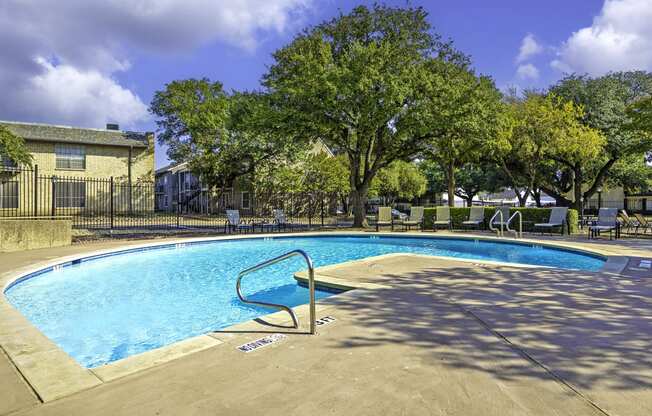 our apartments have a resort style swimming pool with trees