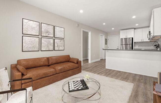 a living room with a couch and a table