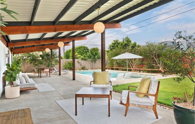 A Fully Furnished Modern Portfolio Home with a Large Backyard Oasis & 3 Comfortable Bedrooms!