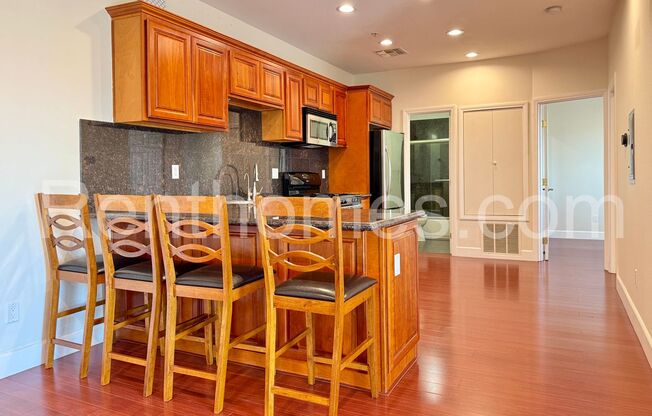 Linda Vista, 7056 Fulton St #14, Gated Complex, City Views, Granite Counters, Wood Floors, 1 Car Garage.