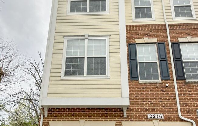 Sizable End Unit Townhome in Wheaton w/ 2 Car Garage!