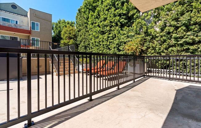 our apartments have a private balcony with a black railing