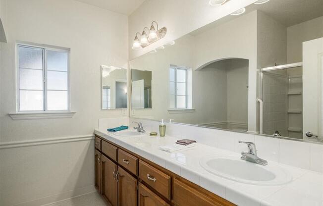 Bathroom with Vanity Lights at Dartmouth Tower at Shaw, Clovis, CA