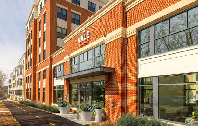 A brick building with the word VALE on it.